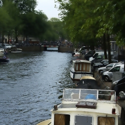 view of canal in Amsterdam with boats